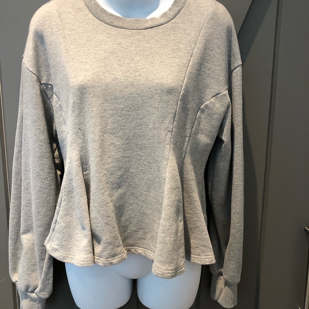 Peplum sweatshirt with puffy sleeve
